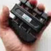 Hand holding a grip strengthening device