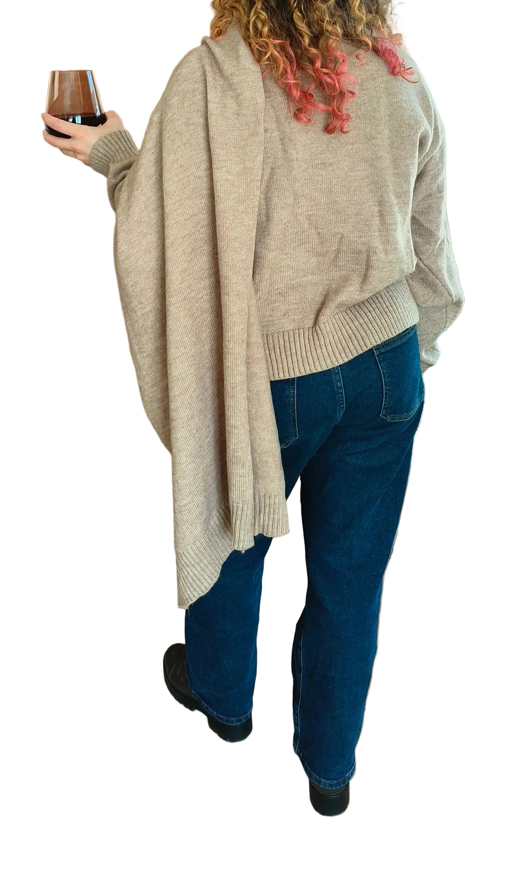 Woman wearing camel knit with shawl collar