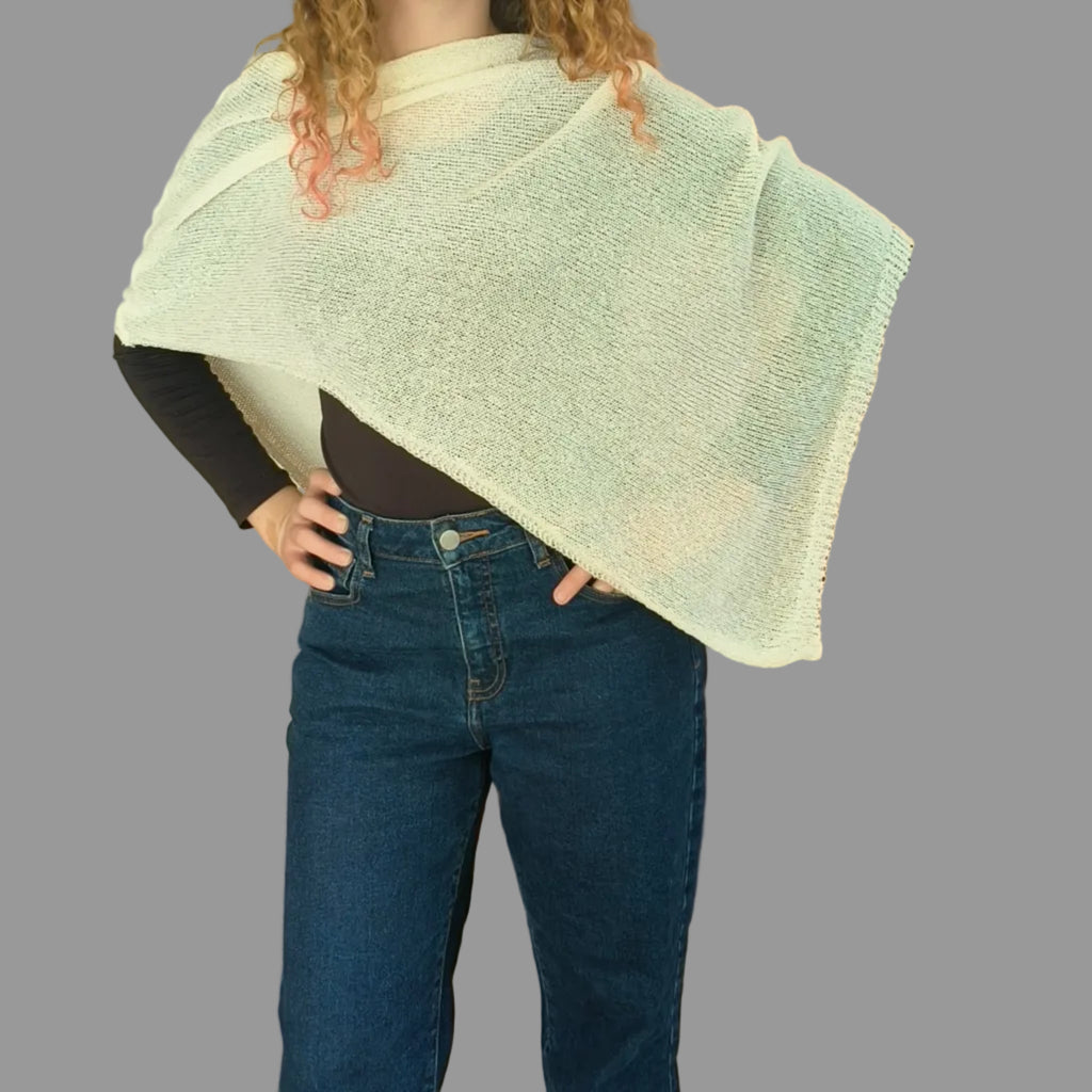 Elegant asymmetrical light knit shawl