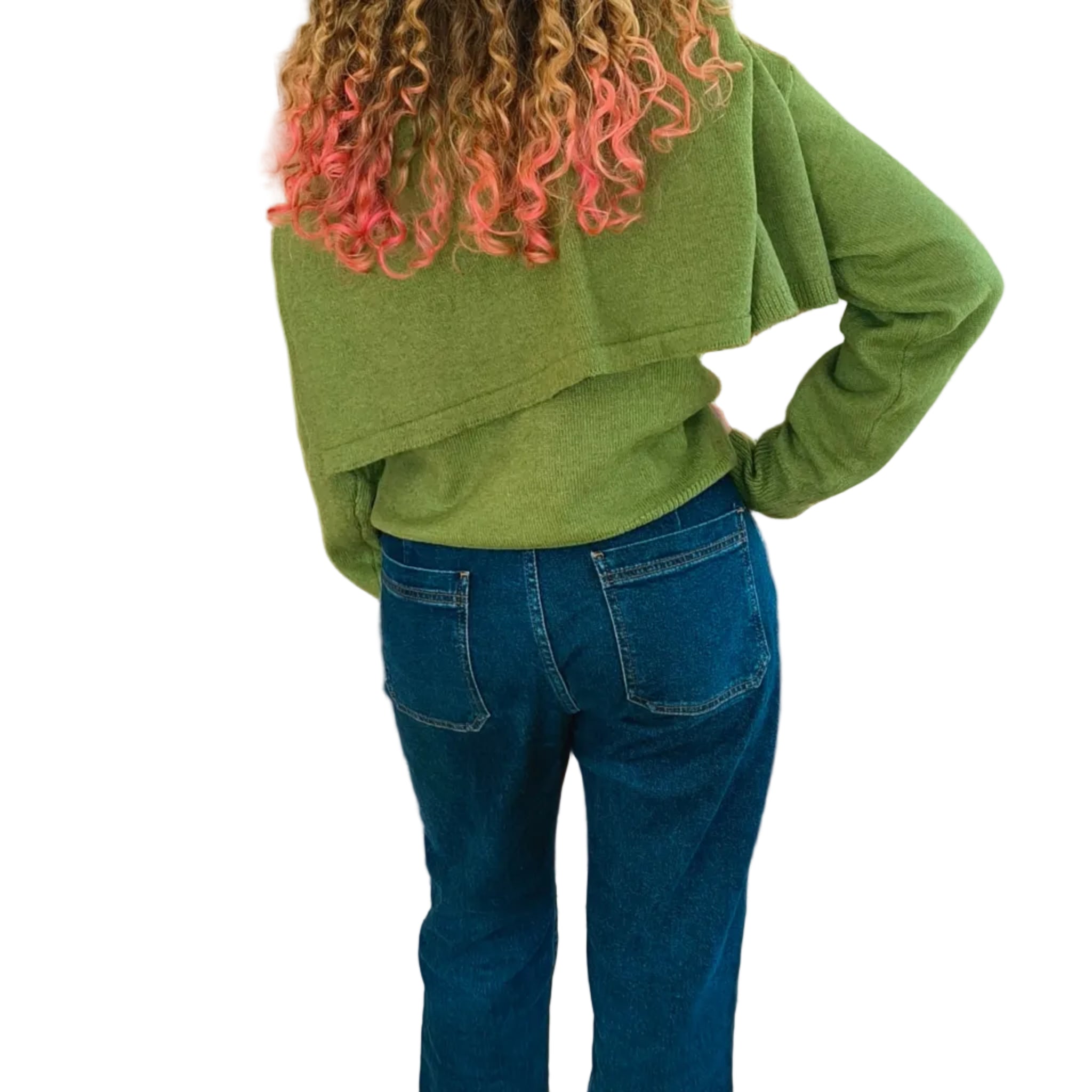Woman wearing olive green turtleneck knit with matching cape shawl