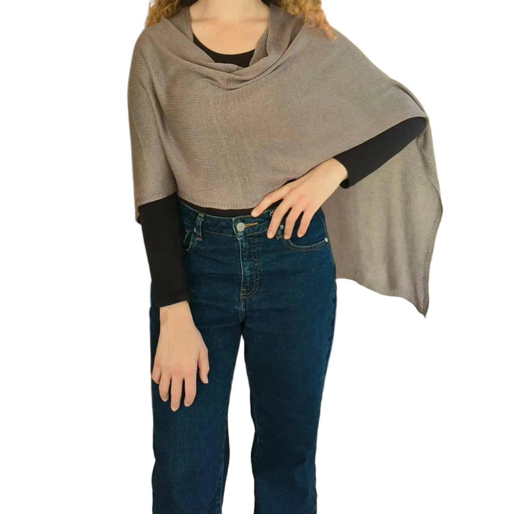 Elegant asymmetrical light knit shawl